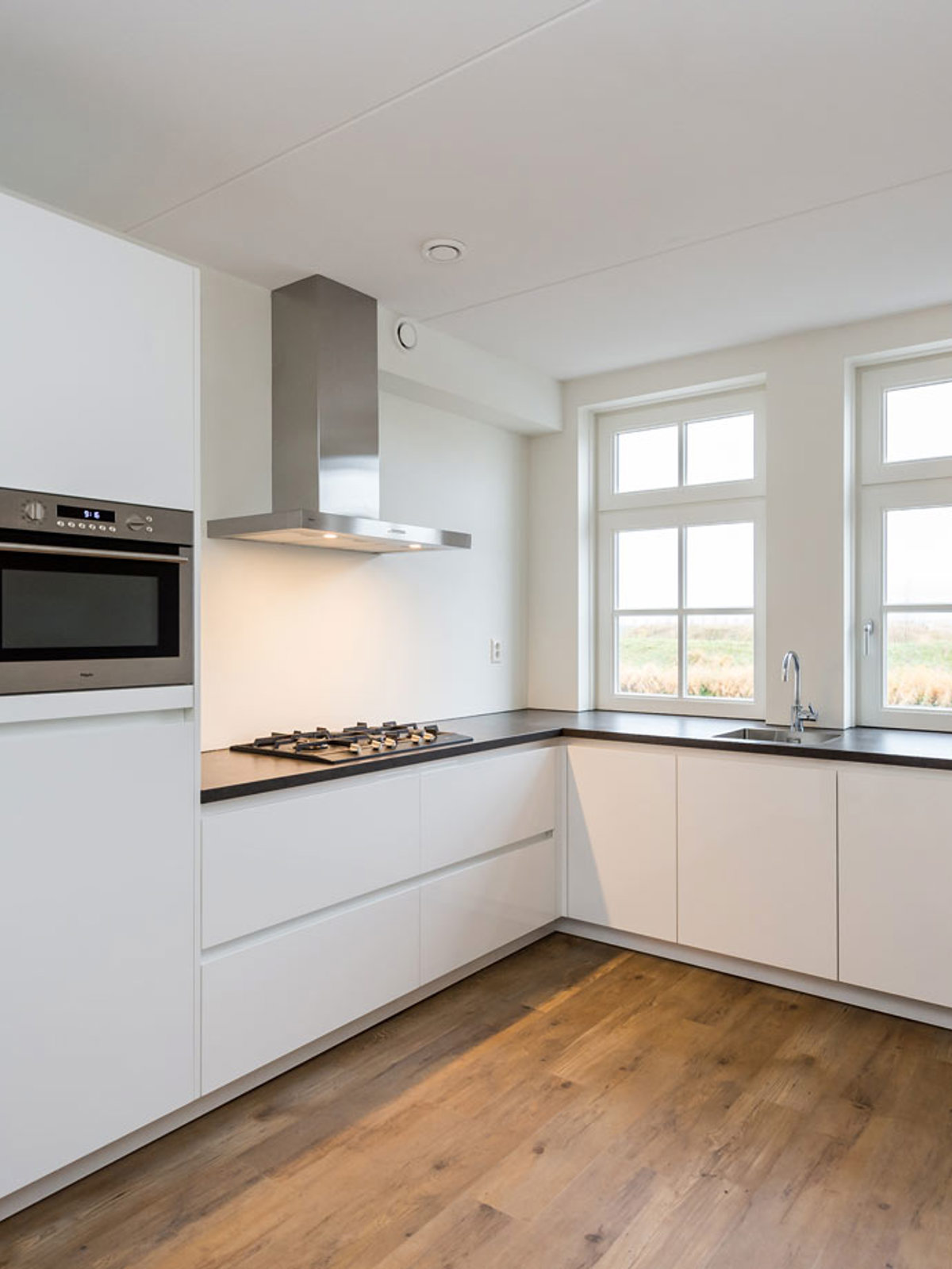 Onze keuken moet zo ruimtelijk mogelijk ogen Familie Troost uit Middelharnis