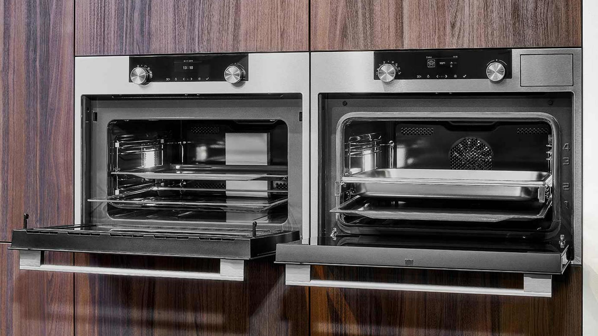 Design keuken met kastenwand, ovens