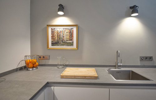 Witte SieMatic keuken Amsterdam, grijs werkblad