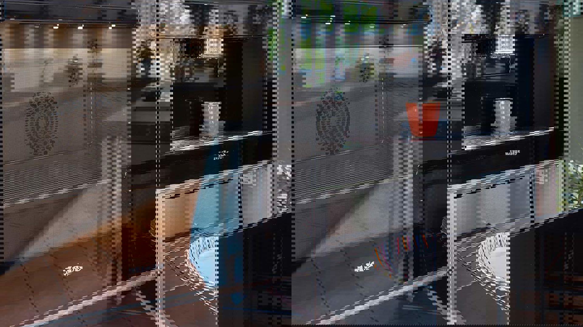 Design keuken met eiland Bussum, warmhoudlade